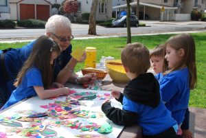 Sue Harbrecht and children on Arbor Day