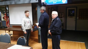 Flotilla Commander Bob Bain swearing in his new Vice Flotilla Commander Wayne Grace