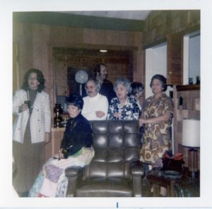 John Sparacino, center, standing with family members