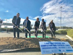 Local administrators  break ground for an express lane Wednesday north of the I-680 toll plaza.