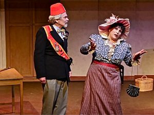 Old miser Horace Vandergelder (John Blytt) with matchmaker Dolly Levi (Jeanine Perasso)