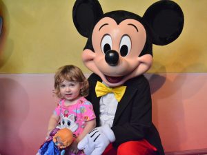 Vivian's granddaughter with Mickey Mouse in 2018