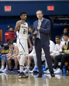 Coach Petiti strategizes with Lorenzo Fonseca.